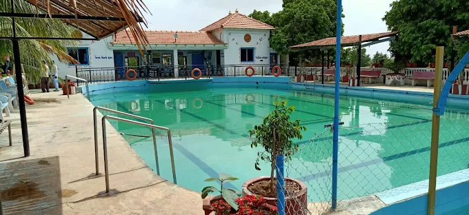 Swimming pool at Panchani Farm Villa and Resort